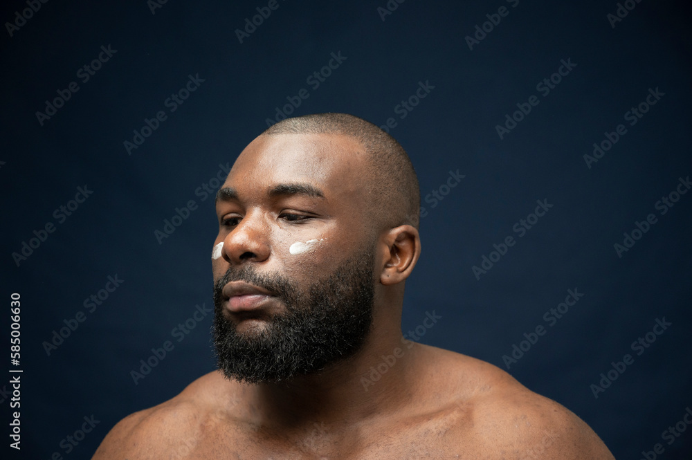 Male African Bearded Model Doing Skin-care Male African Bearded Model Doing Skin-care