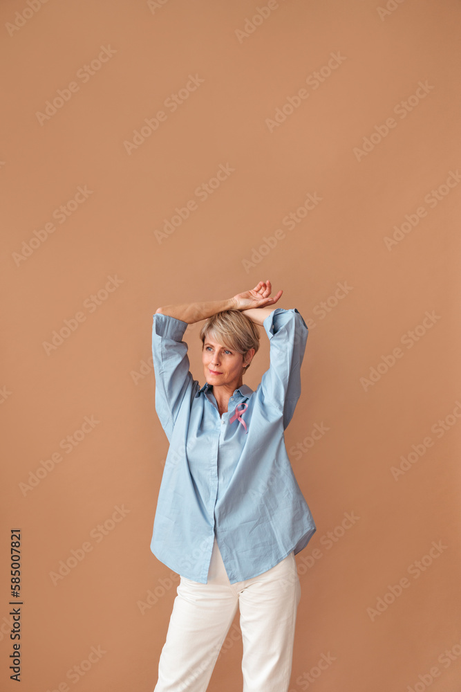 Pretty woman with pink ribbon. Pretty woman with pink ribbon.