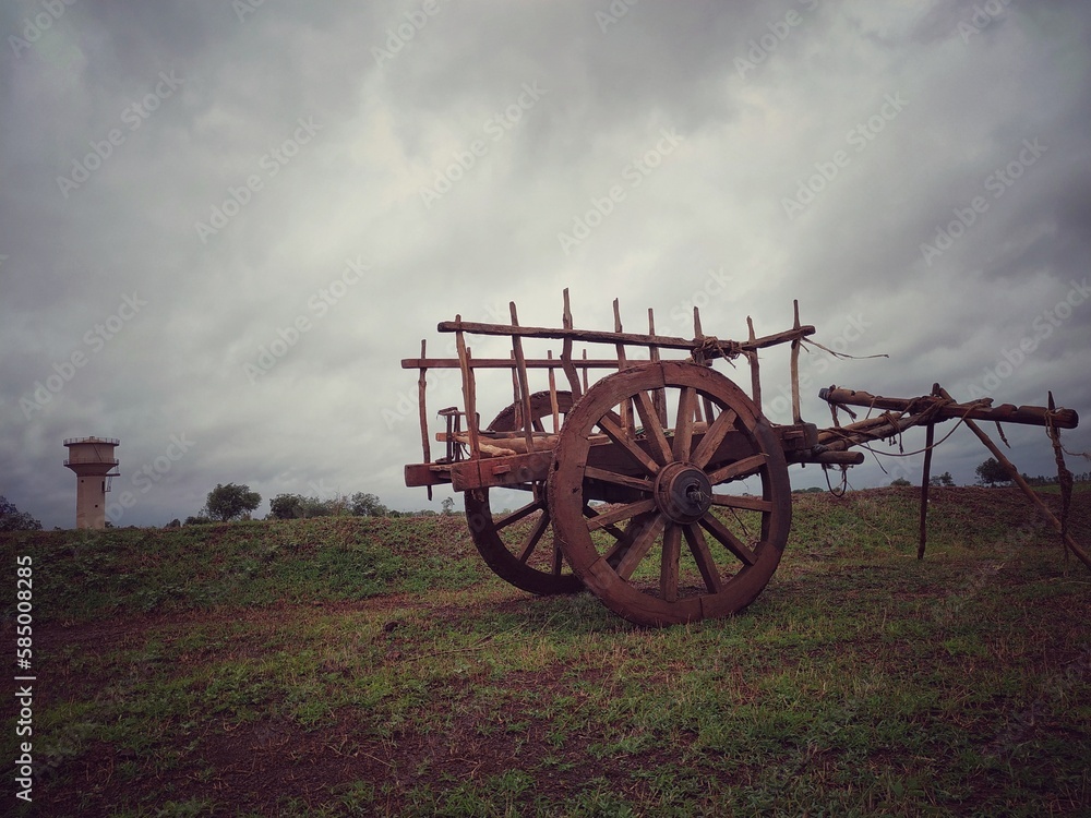 a bullock cart standing on the ground