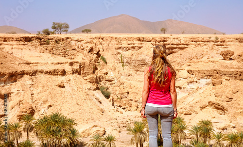 Traveler woman in desert landscape- Africa, Morocco