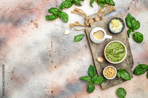 Traditional Italian pesto Basil, olive oil, parmesan, garlic, pine nuts. banner, menu, recipe place for text, top view