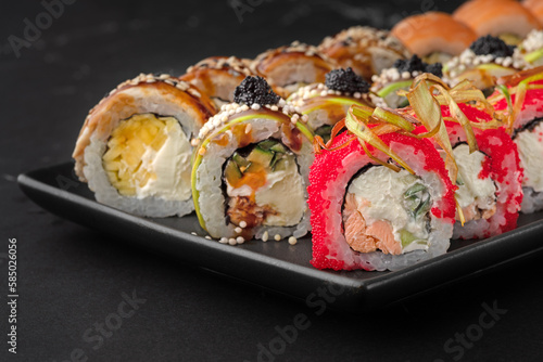 Variety of sushi foodTraditional asian food with raw fish and rice. All you can eat concept