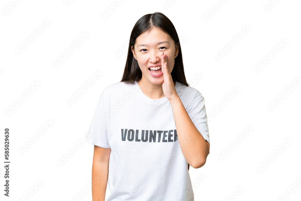 Young volunteer woman over isolated chroma key background shouting with mouth wide open