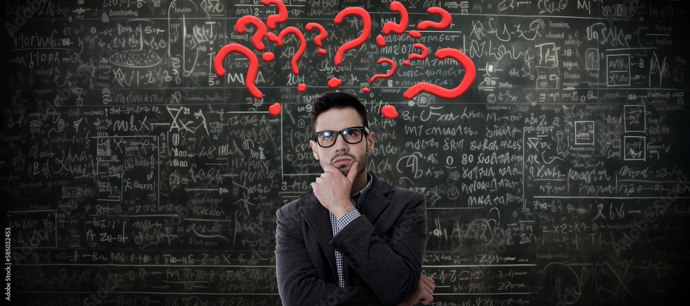 pensive man with math problems on the blackboard pensive man with math problems on the blackboard