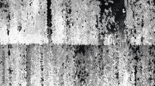 Black and white grunge halftone dots pattern texture background
