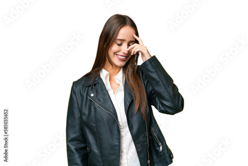 Young beautiful woman over isolated chroma key background laughing