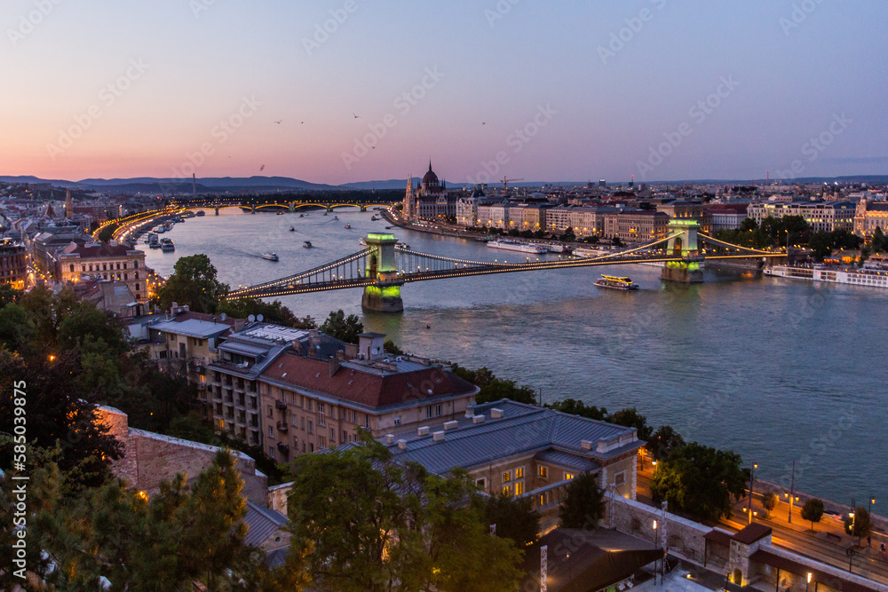 Evening view of Danube river with Szechenyi Lanchid bridge in Budapest, Hungary