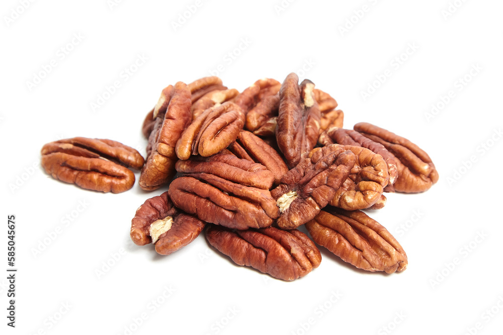 Peeled pecan nuts isolated on a white background. Heap of pecan halves Peeled pecan nuts isolated on a white background. Heap of pecan halves