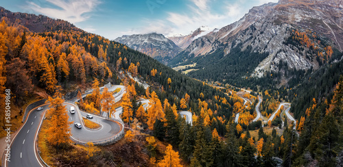 Wonderful Nature landscape of Switzerland. Vivid autumn scenery of Maloja pass, Switzerland, Europe. Amazing, serpentine road is a most popular place of travel and Outdoor vacations in Swiss alps. photo