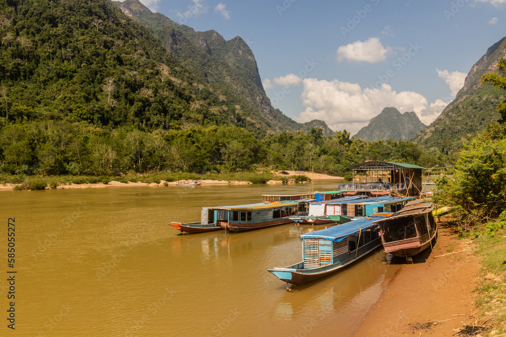 Boats at Nam Ou river in Muang Ngoi Neua village, Laos