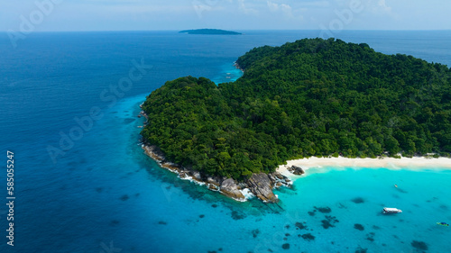 The tropical seashore island in a coral reef ,blue and turquoise sea Amazing nature landscape with blue lagoon © SASITHORN