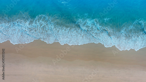 Drone view of beach in wave of turquoise sea water shot, Top view of beautiful white sand background