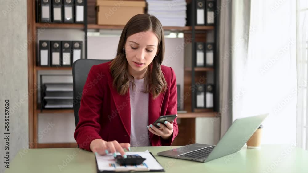 Businesswoman working in the office with working notepad, tablet and laptop documents Businesswoman working in the office with working notepad, tablet and laptop documents