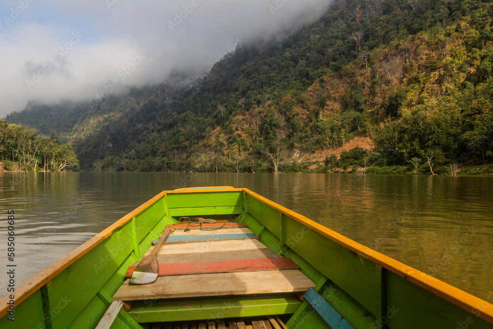 Naklejka premium Boat travelling on Nam Ou river, Laos