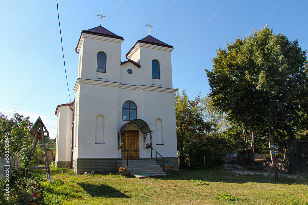 Naklejka premium Catholic church in the center of the city of Kitzman in Bukovina, Ukraine 2014.