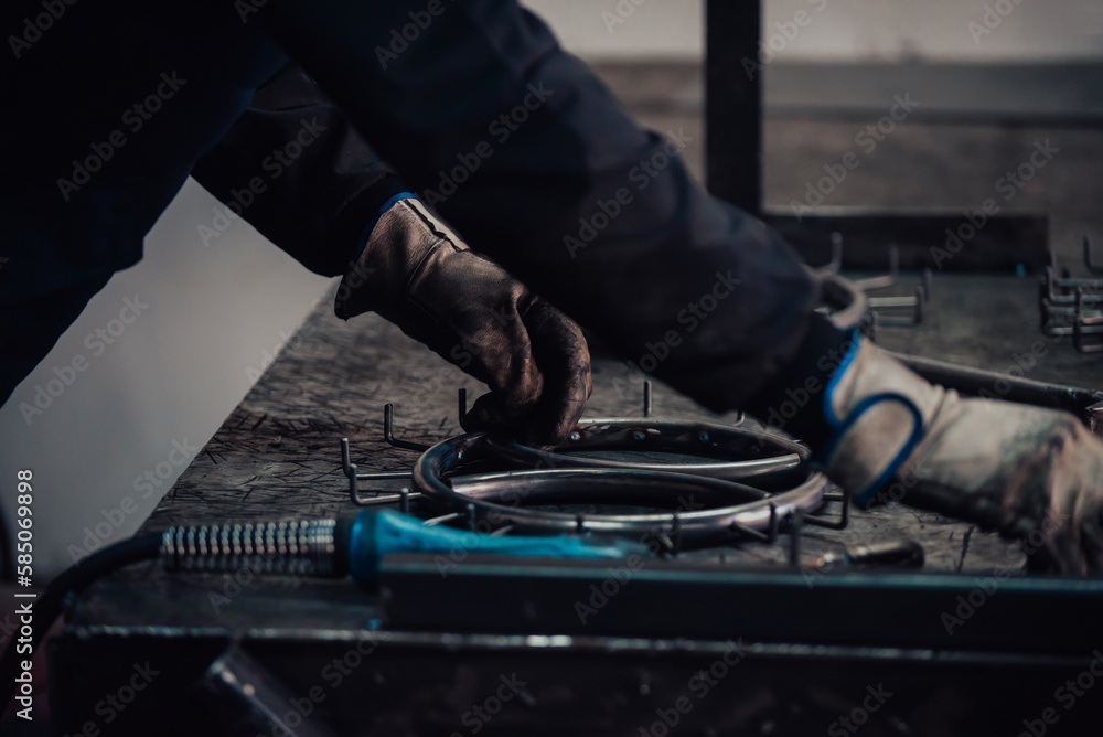 Close up of the steel welding process. Work in the heavy steel industry Close up of the steel welding process. Work in the heavy steel industry