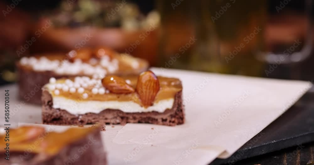 Crispy cake with salted caramel and nuts, delicious sweet dessert made of dough with caramel and nuts Crispy cake with salted caramel and nuts, delicious sweet dessert made of dough with caramel and nuts