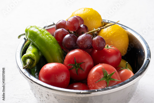 fresh vegetables and fruits in bowl .