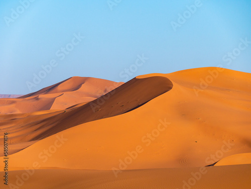 Stunning sand dunes near Merzouga, Morocco during sunset - Landscape shot 8