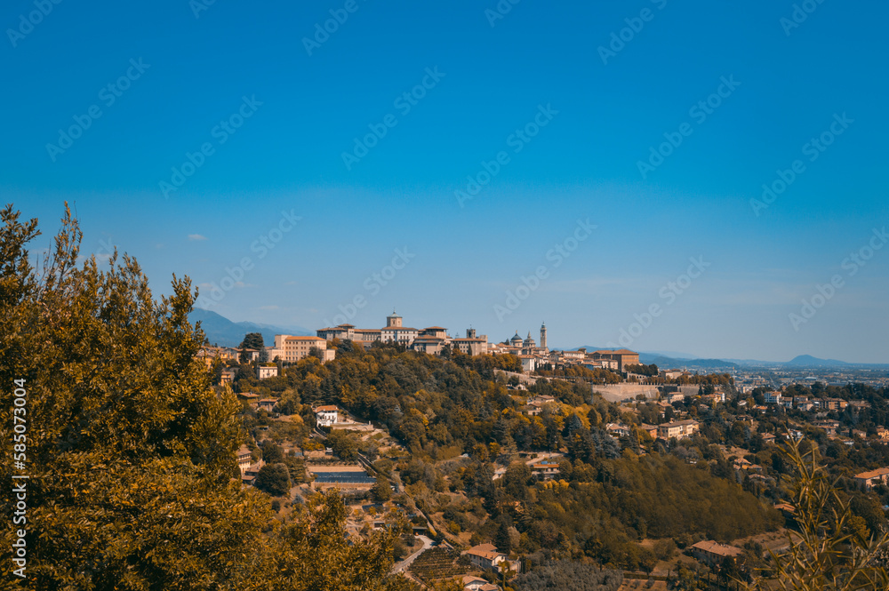 Landscape of Bergamo Alta in Italy from the hills surrounding the city, during a summer day.