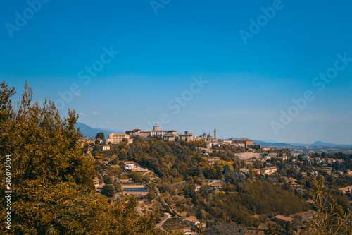 Landscape of Bergamo Alta in Italy from the hills surrounding the city, during a summer day.