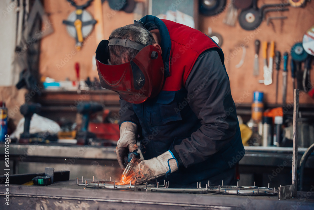 Welder erecting technical steel. Industrial steel welder in factory technical Welder erecting technical steel. Industrial steel welder in factory technical