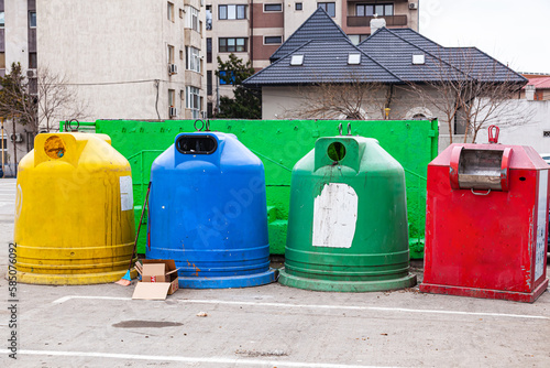 Municipal waste bins in four different colors for different types of waste.