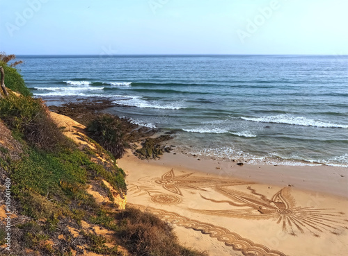 Beautiful beach mandala in Albufeira in Portugal Praia Maria Luisa