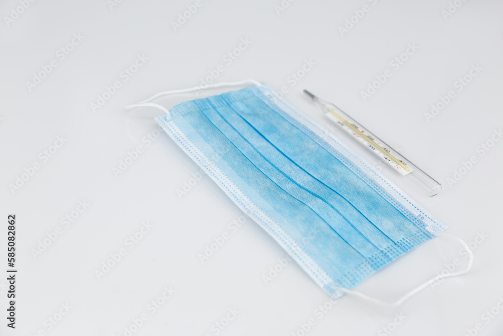 Surgical mask,Protective mask and te thermometer. Surgical mask,Protective mask and te thermometer.
