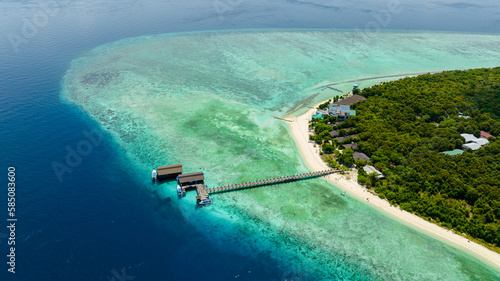 Aerial view of beautiful sandy beach on the Pom Pom islet. Seascape in the tropics.Tun Sakaran Marine Park. Borneo, Sabah, Malaysia. photo