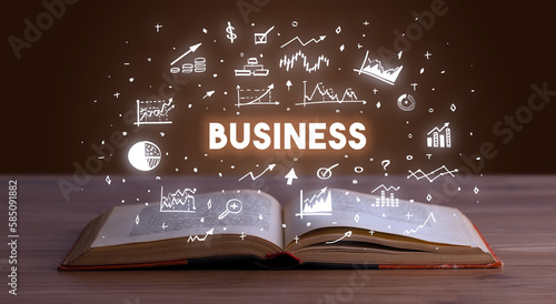 Business inscription coming out from an open book
