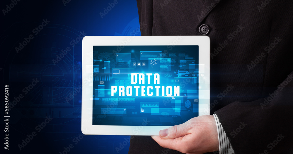 Person holding tablet, security concept Person holding tablet, security concept
