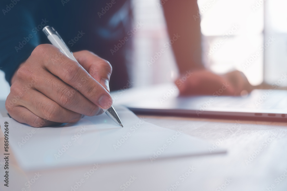 businessman taking note on white paper with pen on table in office, meeting brainstroming concept, writing business plans and workflow businessman taking note on white paper with pen on table in office, meeting brainstroming concept, writing business plans and workflow