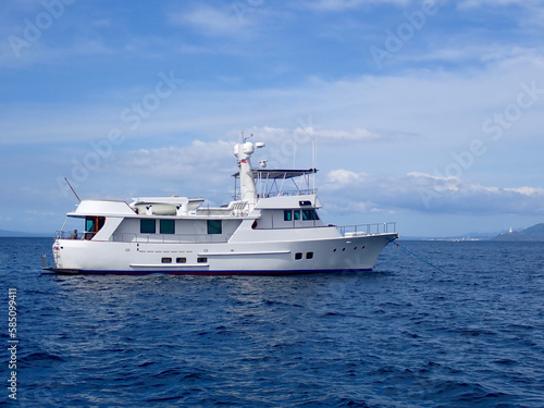 Motor yacht. Cruise ship. Safari Dive Boat. Luxury white motor yacht on the high seas.  © Houston