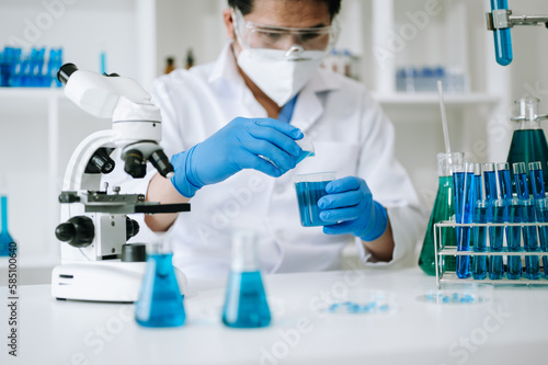 Male biotechnologist testing new chemical substances in a laboratory.