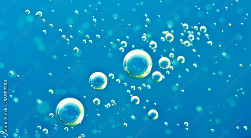 Underwater background of clear blue water with oxygen bubbles closeup Underwater background of clear blue water with oxygen bubbles closeup