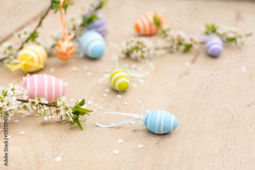 Easter decorative composition with painted eggs, flowering branches.