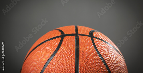 Basketball ball on the grey background.