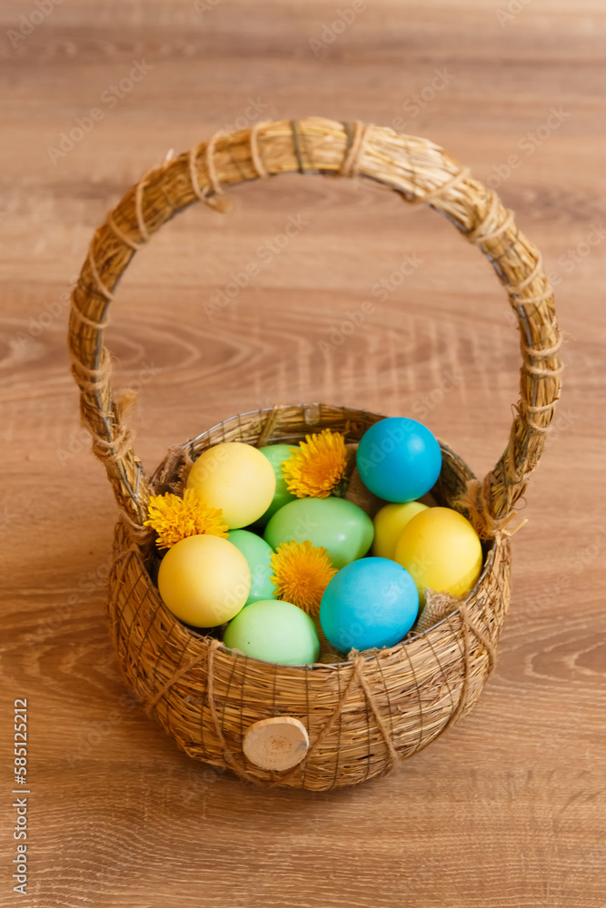Fototapeta premium Paint eggs for Easter, bright Easter holiday, children paint eggs, colored eggs in a basket, colored eggs on a stand, Holiday background 
