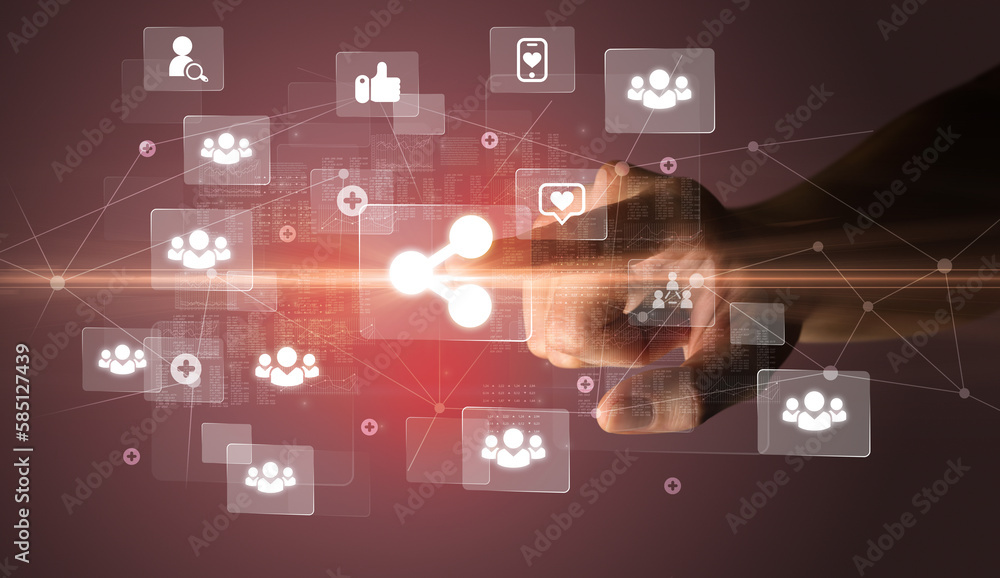 Hand pressing social media multimedia application screen with media icons on futuristic concept Hand pressing social media multimedia application screen with media icons on futuristic concept