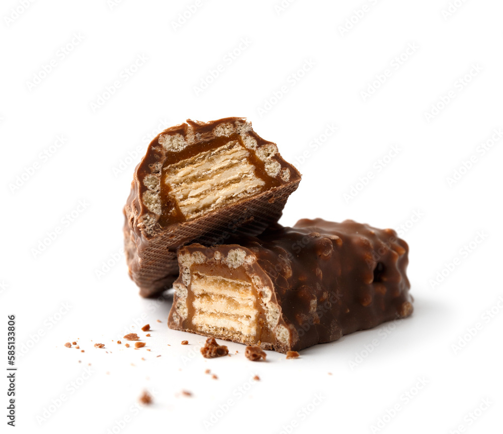 Two halves of a crispy chocolate bar on a white background. Two halves of a crispy chocolate bar on a white background.