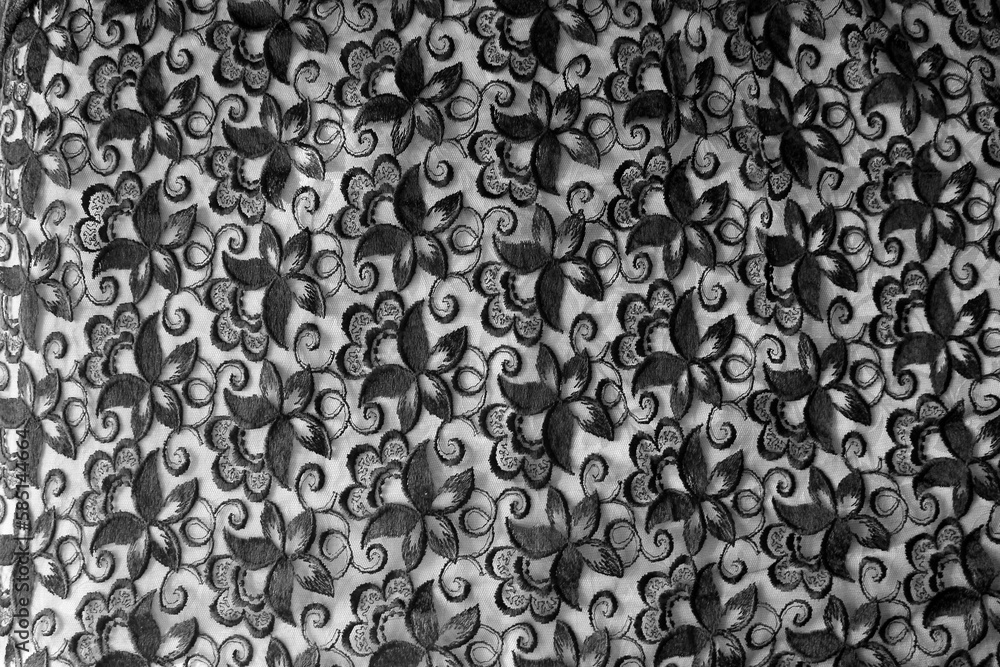 Floral pattern on fabric as a background Floral pattern on fabric as a background