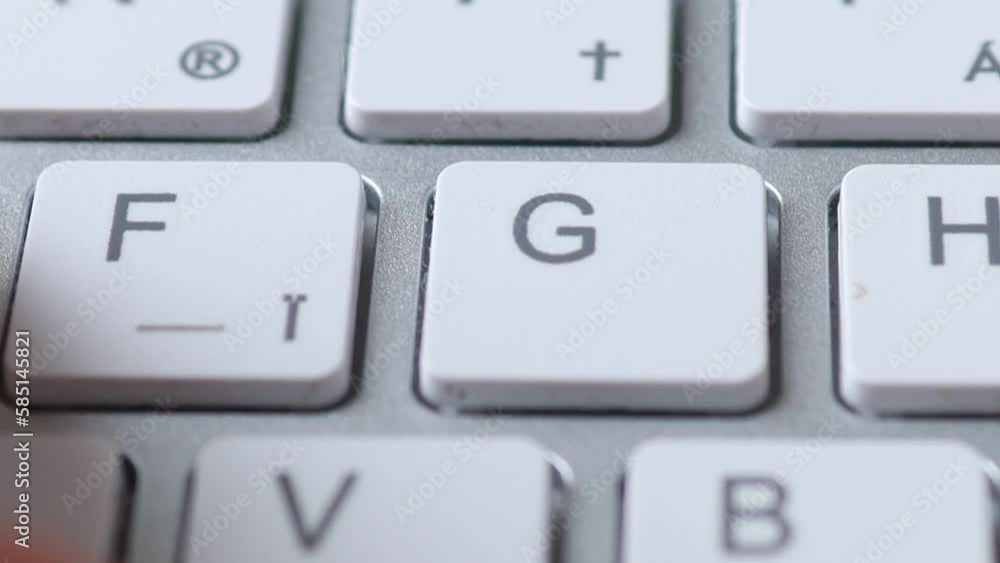 Close-up of male hands typing on keyboard indoors. Businessman working in office or student browsing information Close-up of male hands typing on keyboard indoors. Businessman working in office or student browsing information