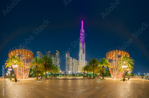 Beautiful night at landmark 81, the tallest building in Vietnam. The building lights up with colorful lights in the evening