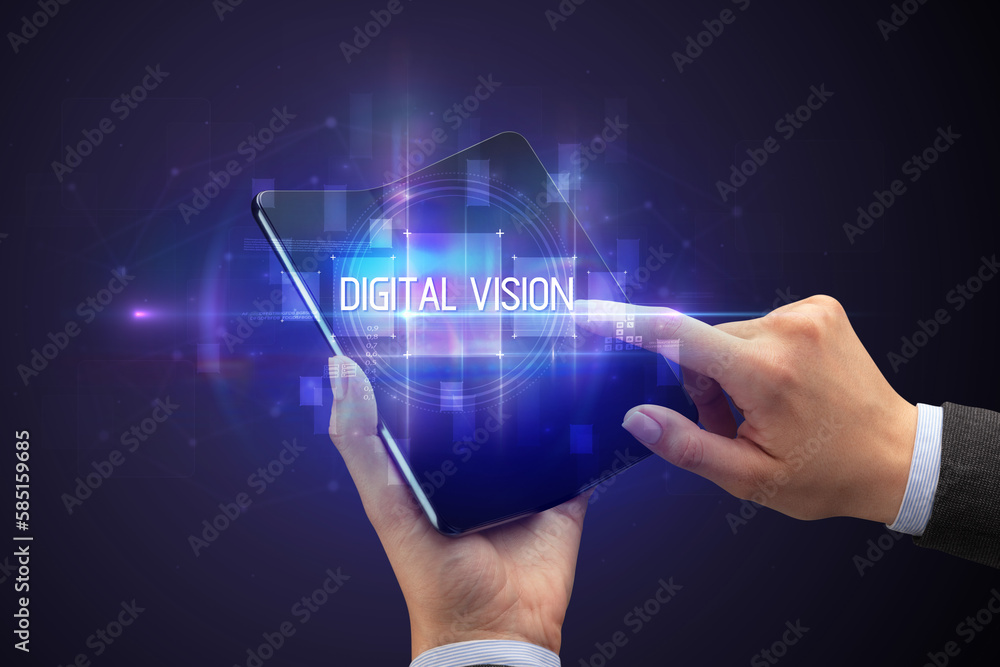 Businessman holding a foldable smartphone Businessman holding a foldable smartphone