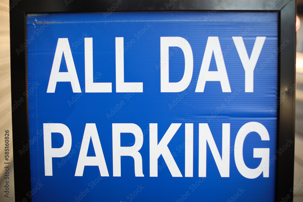 A green and white square sign with 