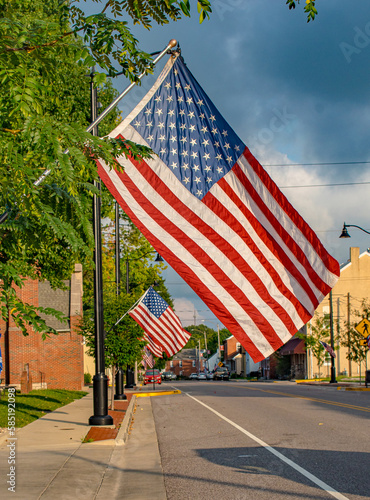 Small Town Main Street USA with the American flag Old Glory