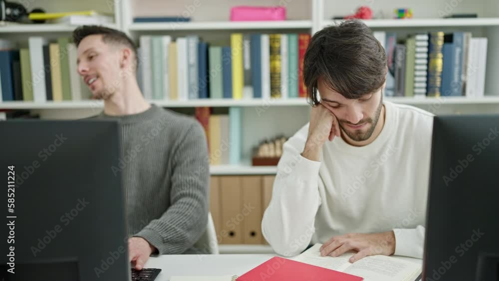 Two men students asking for silent studying at library university Two men students asking for silent studying at library university