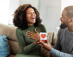 gift woman man couple happy love happiness present surprise romantic smiling together girlfriend boyfriend celebration young valentine male person female holiday romance