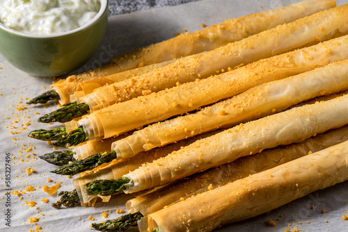 Cooked asparagus wrapped in phyllo dough.